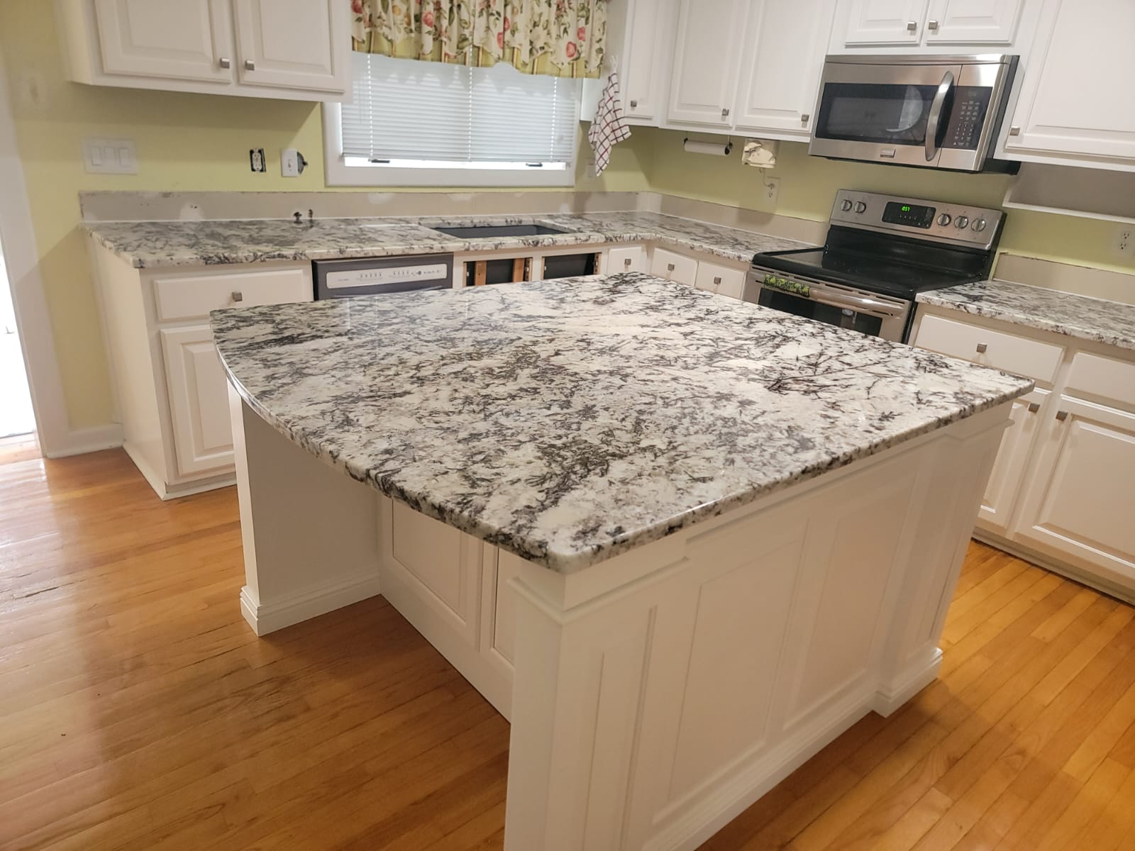 Granite island fabricated and installed by Hands On Granite
